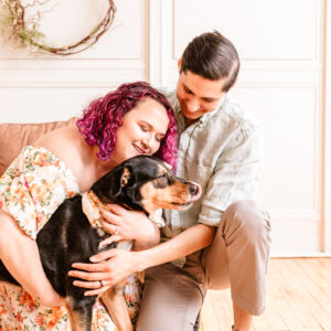 couple with their dog in a studio professional photography session ct photography