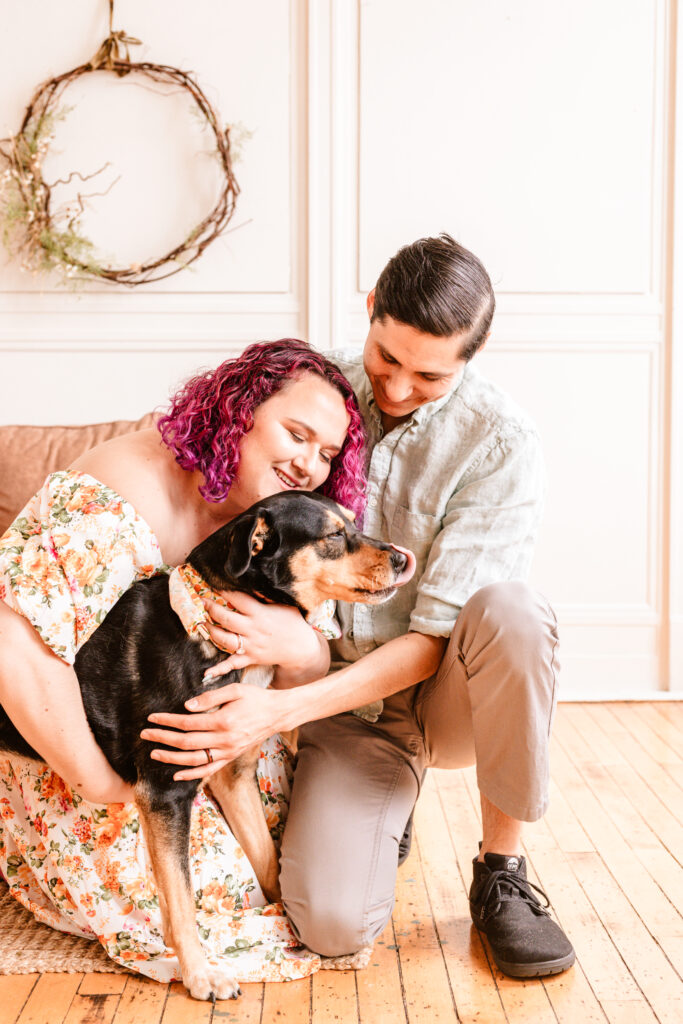 couple with their dog in a studio professional photography session ct photography