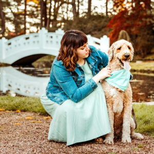 spring pet photography girl with golden doodle at wickham park ct