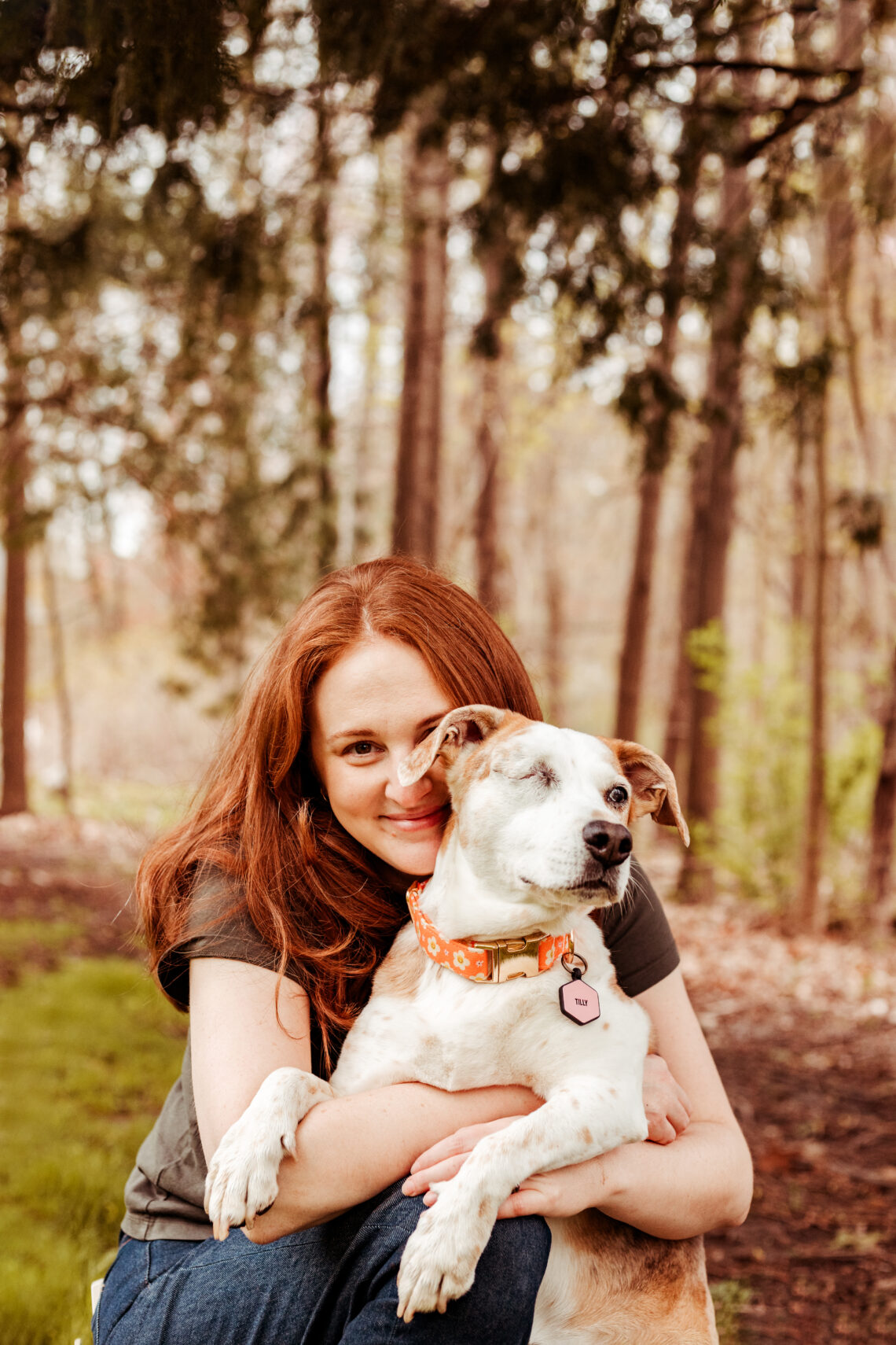 smiling woman with her dog professional pet photography